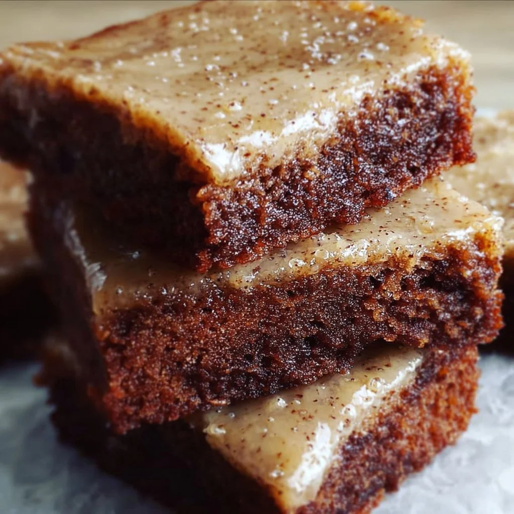 Homemade banana bread brownies displayed on a wooden table