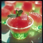 Refreshing Malibu watermelon rum jello shots ready to serve at a summer party.