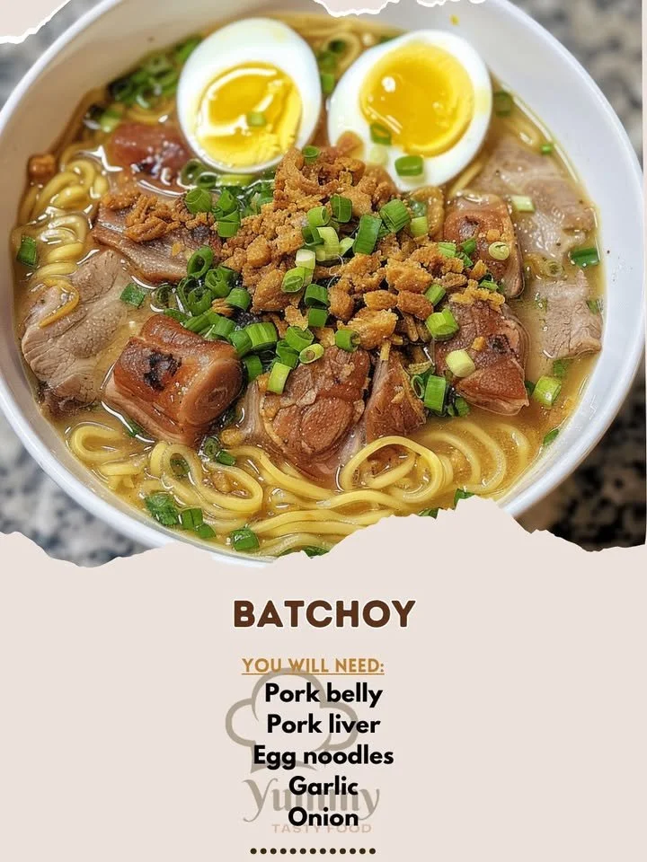 A bowl of Batchoy, a traditional Filipino noodle soup with pork, broth, and toppings.
