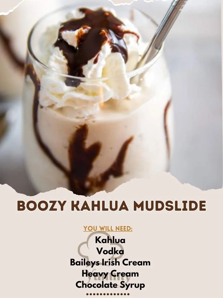 Creamy Kahlua Mudslide cocktail served in a glass with a chocolate drizzle.