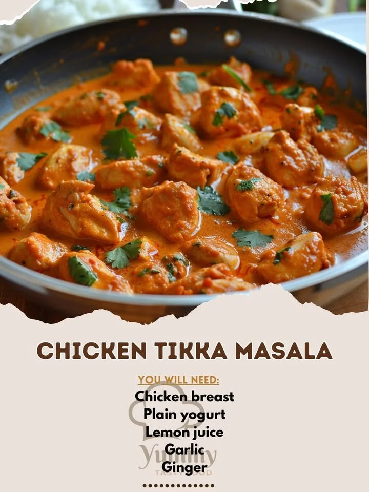 Delicious Chicken Tikka Masala served with rice and garnished with cilantro.