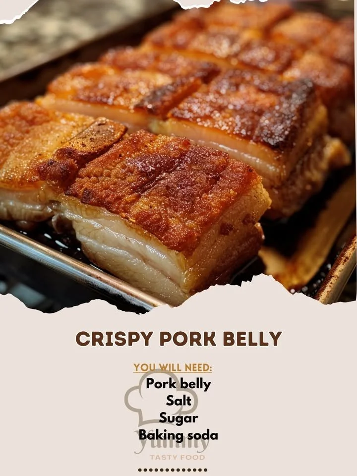 Delicious crispy pork belly served on a plate with garnishes
