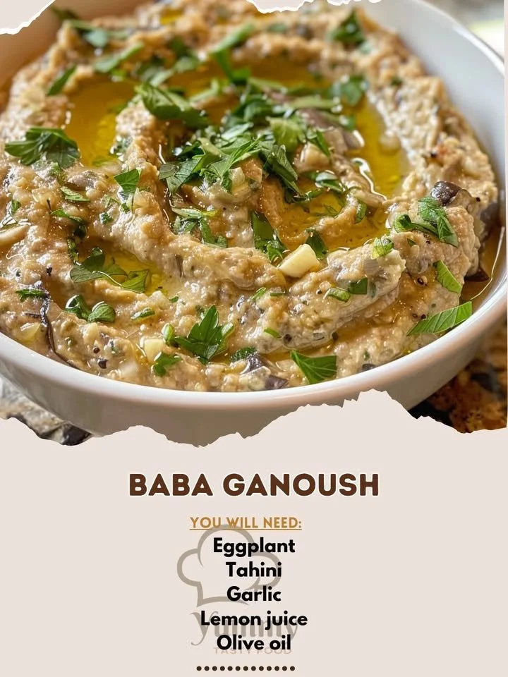 Delicious eggplant dip served in a bowl with crackers and vegetables