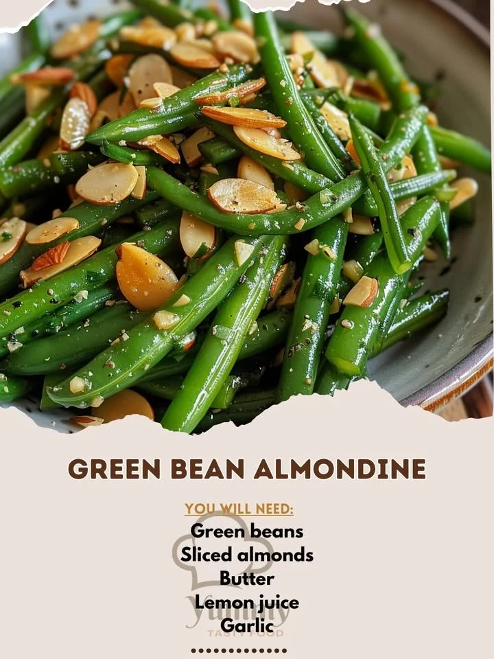 Plate of green bean almondine with toasted almonds and fresh green beans