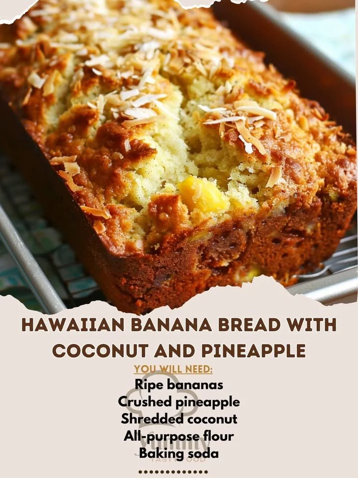 Hawaiian Banana Bread topped with coconut and pineapple on a wooden table