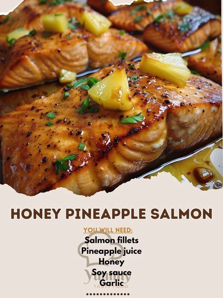 Honey Pineapple Salmon dish garnished with fresh herbs and pineapple slices.