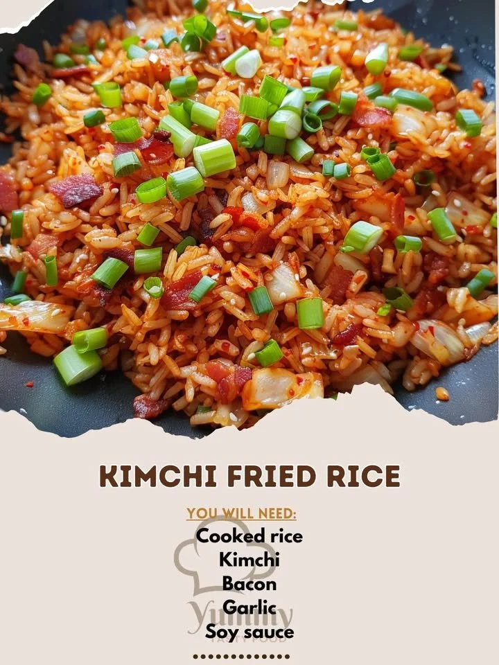 Delicious Kimchi Fried Rice topped with green onions and sesame seeds.