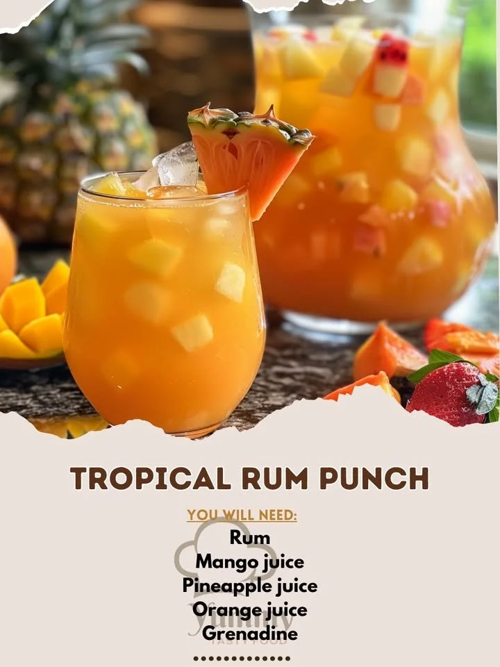 Refreshing Tropical Rum Punch cocktail served with fresh fruit garnish