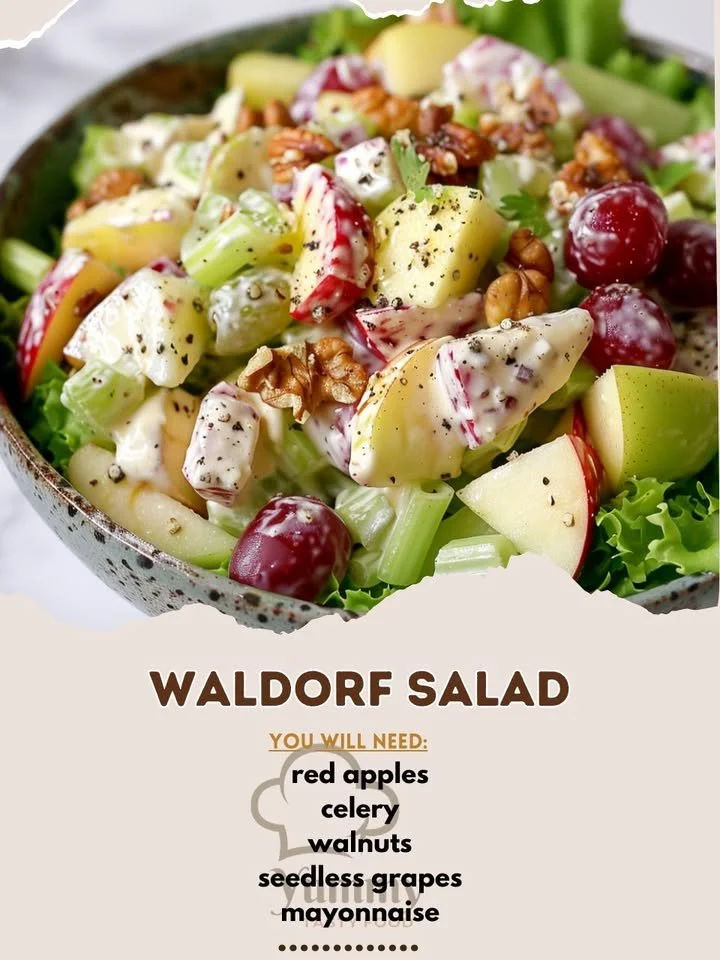 A fresh Waldorf Salad featuring apples, walnuts, celery, and grapes served in a bowl.