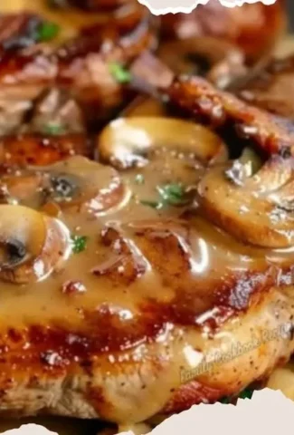 Delicious Bacon Mushroom Pork Chops garnished with fresh herbs