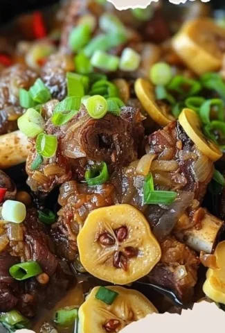 Delicious bowl of balbacua garnished with herbs and spices