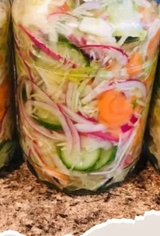 A vibrant bowl of Depression Era Salad showcasing fresh vegetables and creative ingredients.
