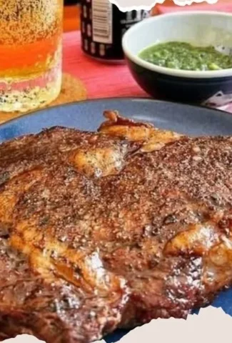 Delicious ribeye steak on a plate with herbs and spices