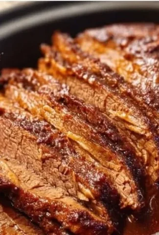 Delicious slow cooker beef brisket served with sides